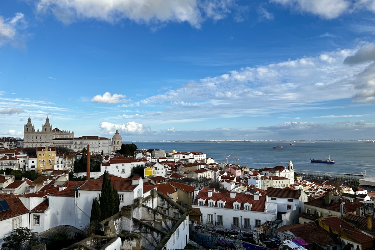 Lisbon cityscape with colourful buildings and tram