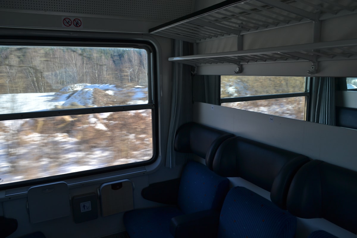 Split image of a settled apartment workspace and a backpack at a train station