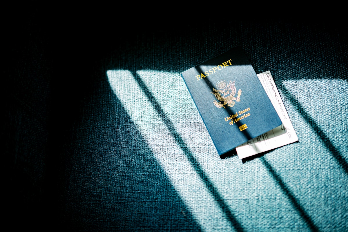 Passport with visa stamps and application documents